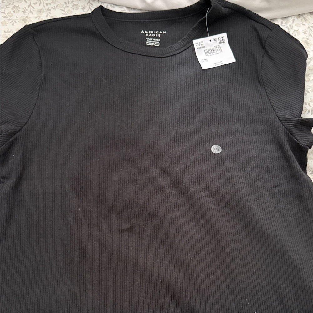 American Eagle black tee.